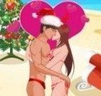 Casal  no natal beijar na praia